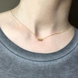 Tiny Karma Wheel Necklace Silver